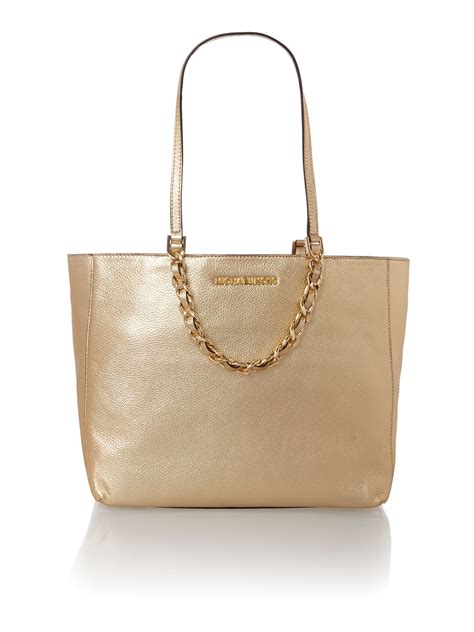 metallic bags michael kors|Michael Kors metallic gold handbags.